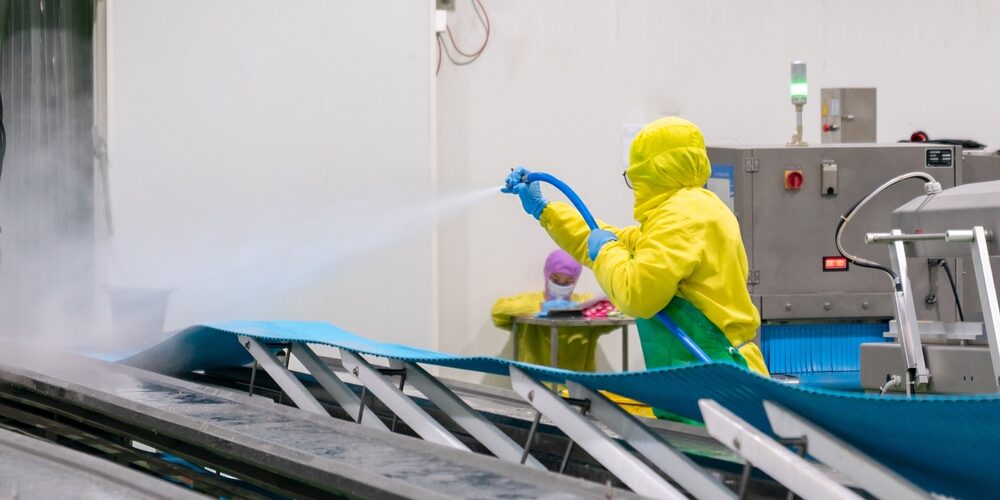 Worker,Use,High,Pressure,Water,Spray,Cleaning,Conveyor,Belt,In